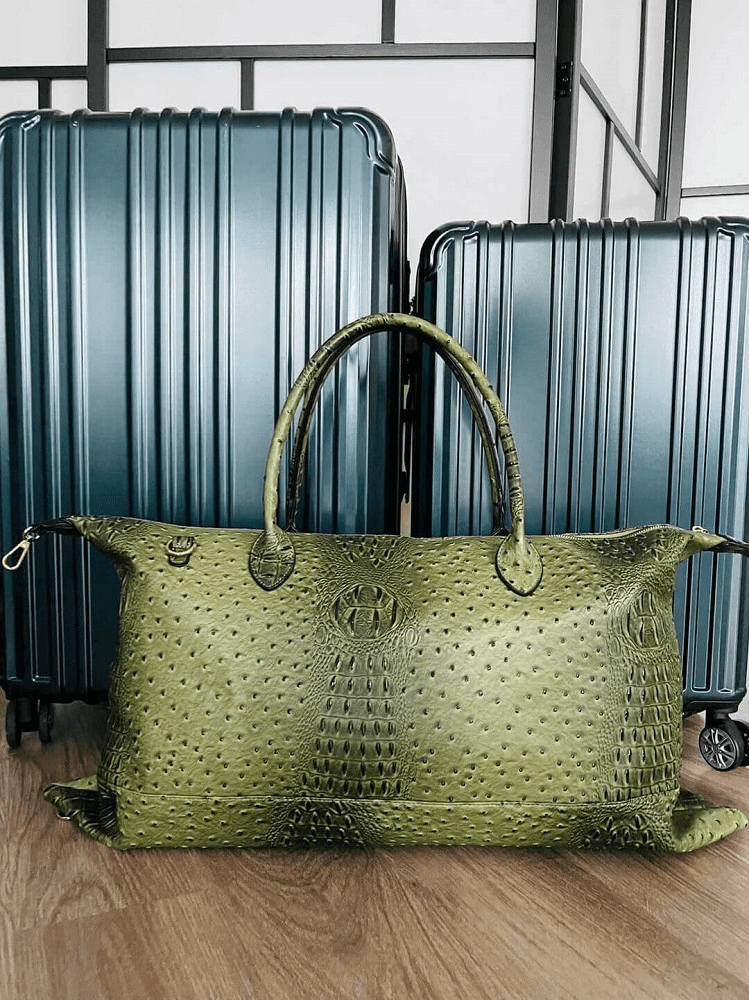 green faux alligator duffle bag from urbane skin