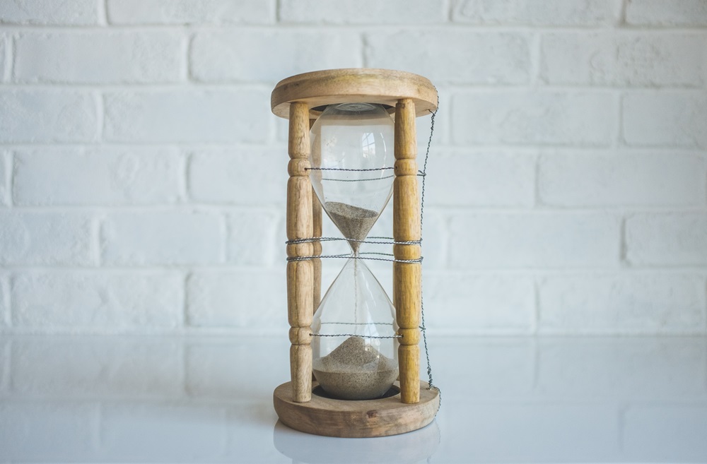 image of an hourglass with sand in it