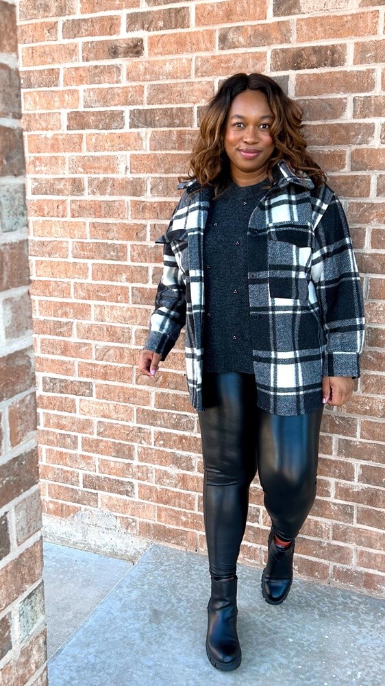 leather leggings outfit featuring dark charcoal sweater and black plaid shacket 